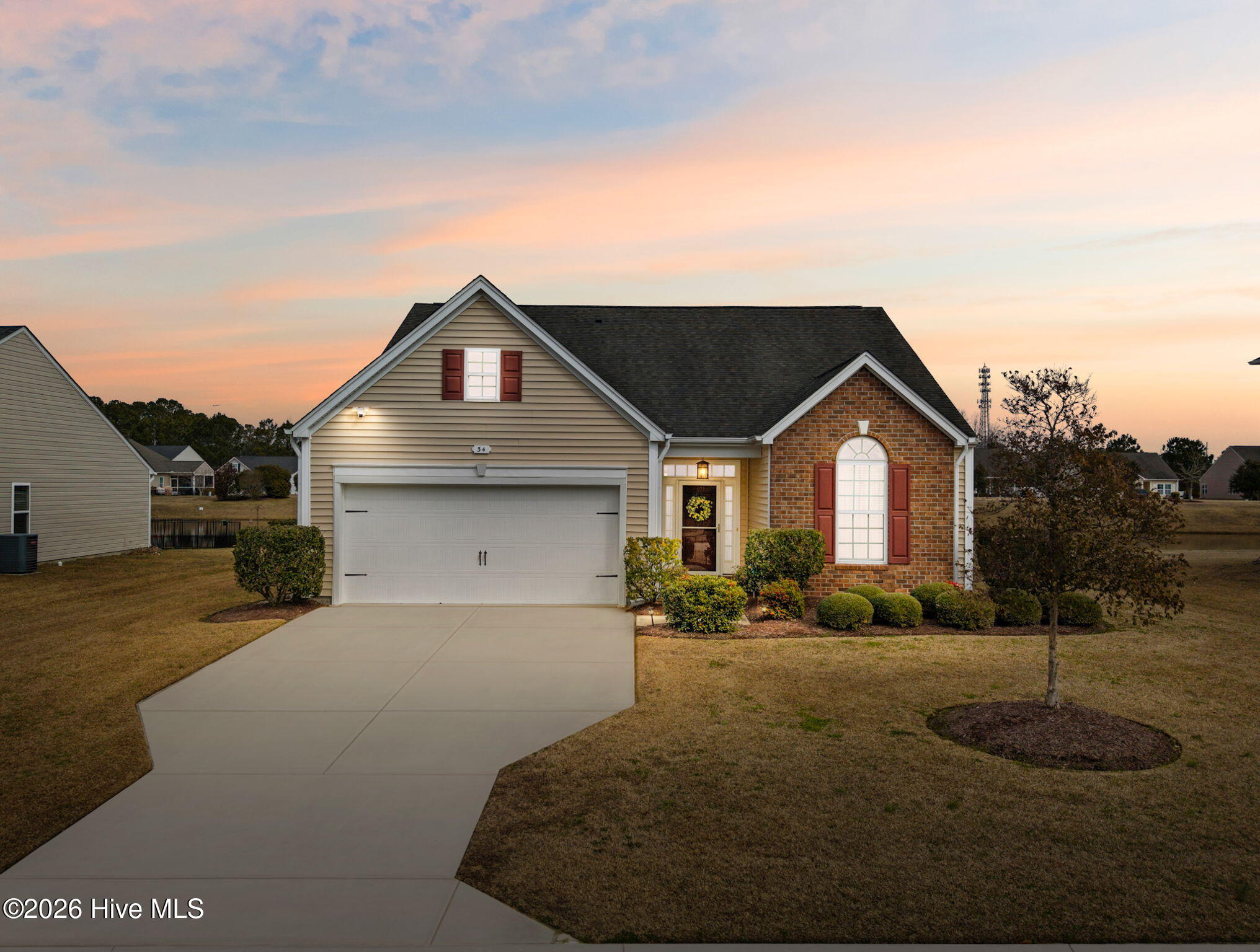 34 Lighthouse Cove Loop, Unit 113 Calabash, NC 28467 - Photo 2 of 47 3-web-or-mls-DJI_20260208114709_0341_twi