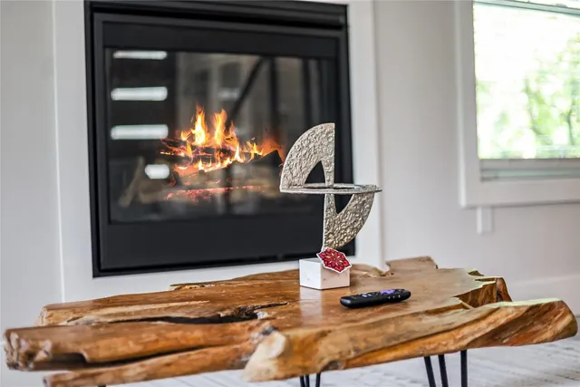 a bedroom with furniture and wooden floor