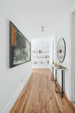 a view of kitchen with wooden floor