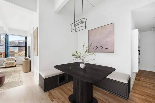 a view of a dining room with furniture