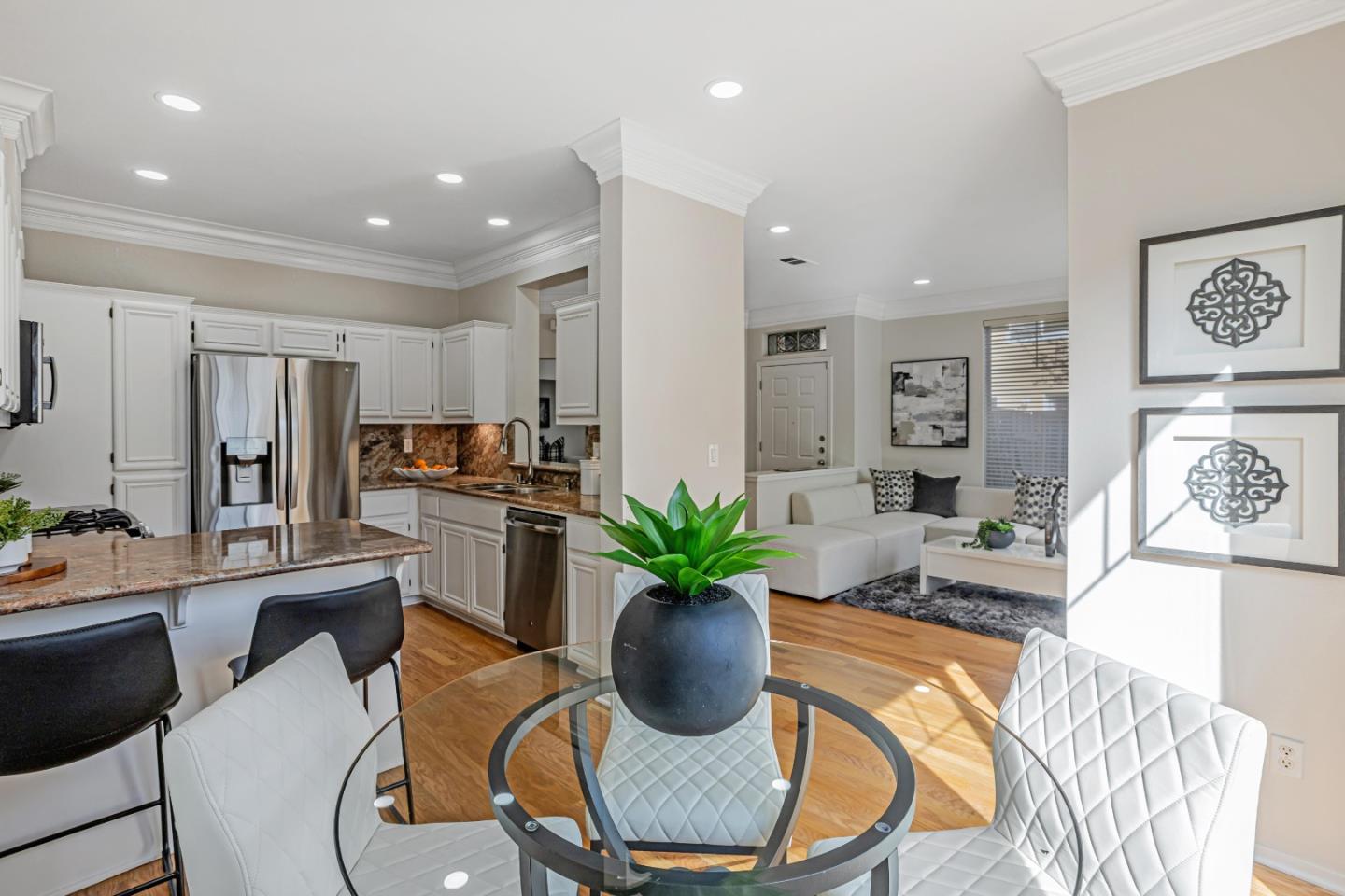 298 Gemstone Way Milpitas, CA 95035 - Photo 18 of 41 a dining room with furniture and a potted plant