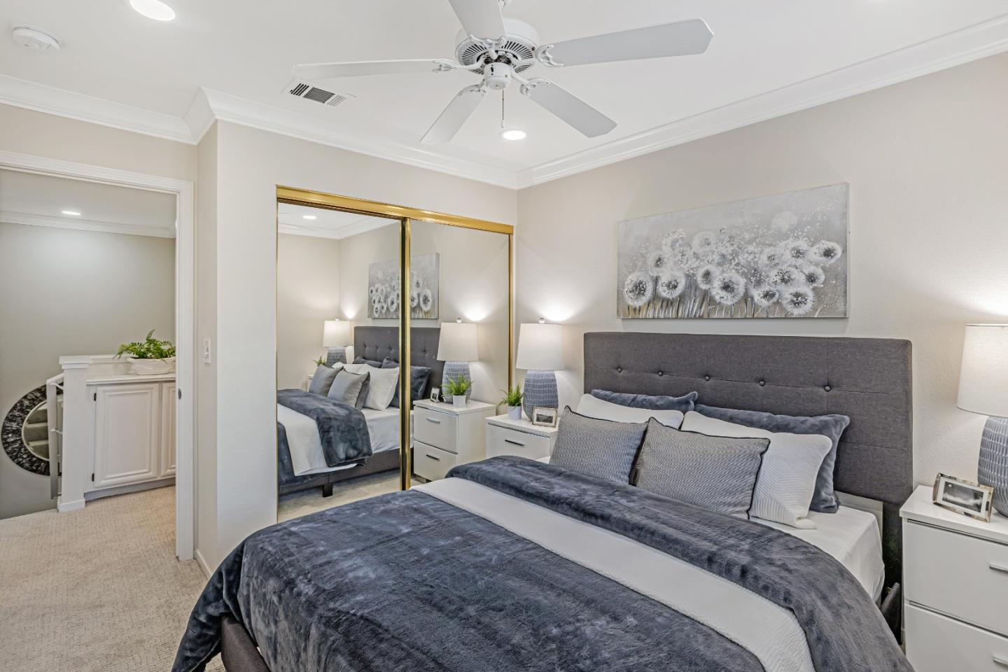 298 Gemstone Way Milpitas, CA 95035 - Photo 21 of 41 a bed room with a bed and a chandelier