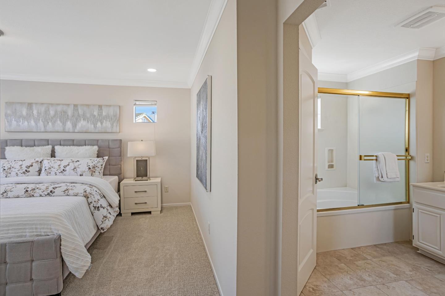 298 Gemstone Way Milpitas, CA 95035 - Photo 31 of 41 a spacious bedroom with a bed and a walk in closet