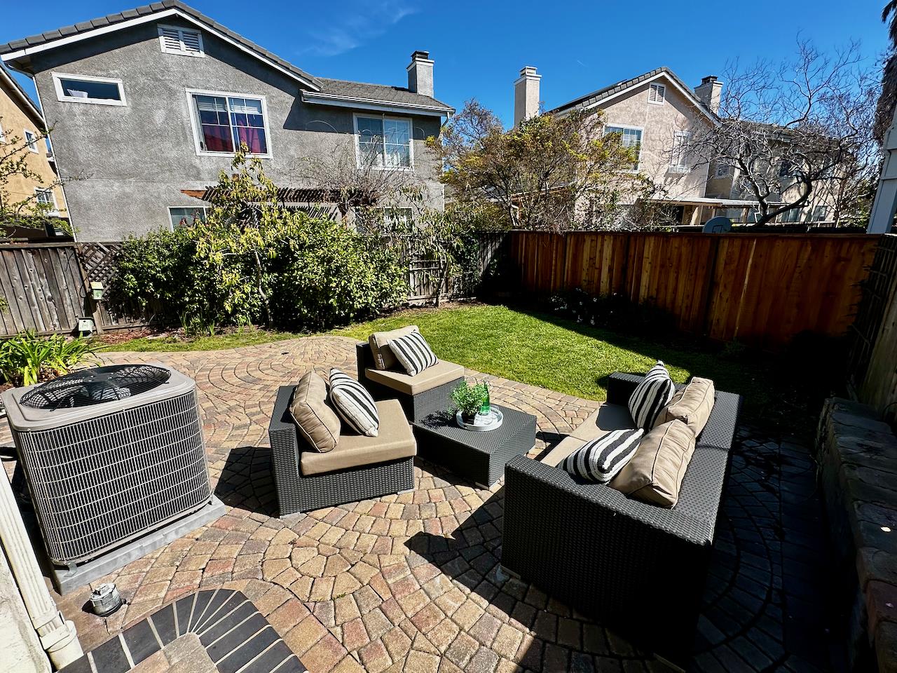 298 Gemstone Way Milpitas, CA 95035 - Photo 34 of 41 a view of outdoor sitting area with furniture and wooden fence