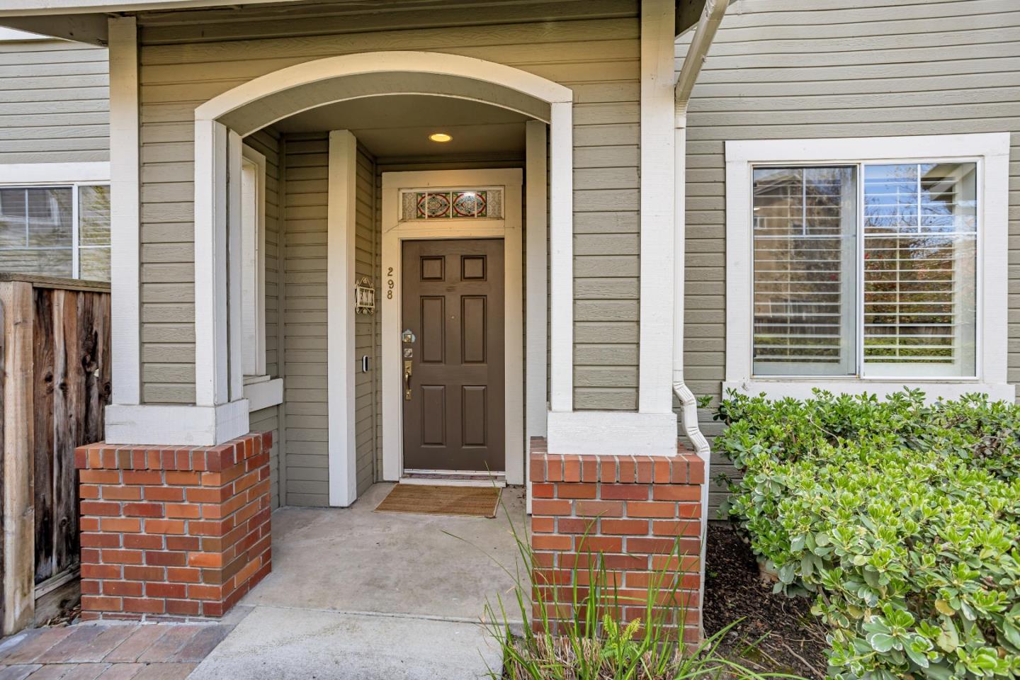 298 Gemstone Way Milpitas, CA 95035 - Photo 4 of 41 a front view of a house with a shower