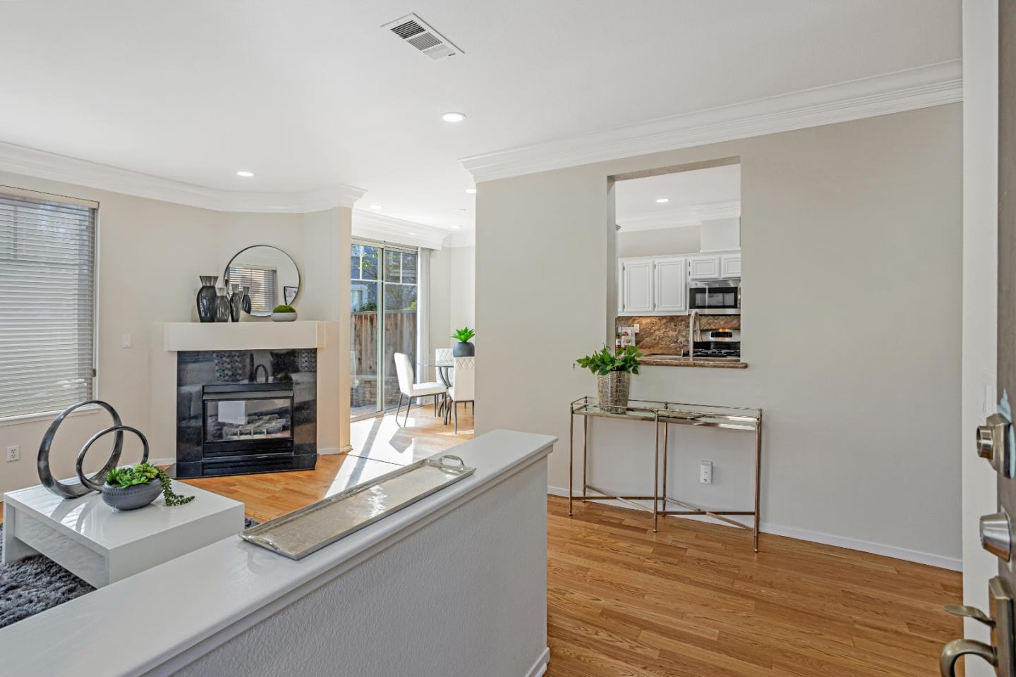 298 Gemstone Way Milpitas, CA 95035 - Photo 5 of 41 a living room with furniture and a fireplace