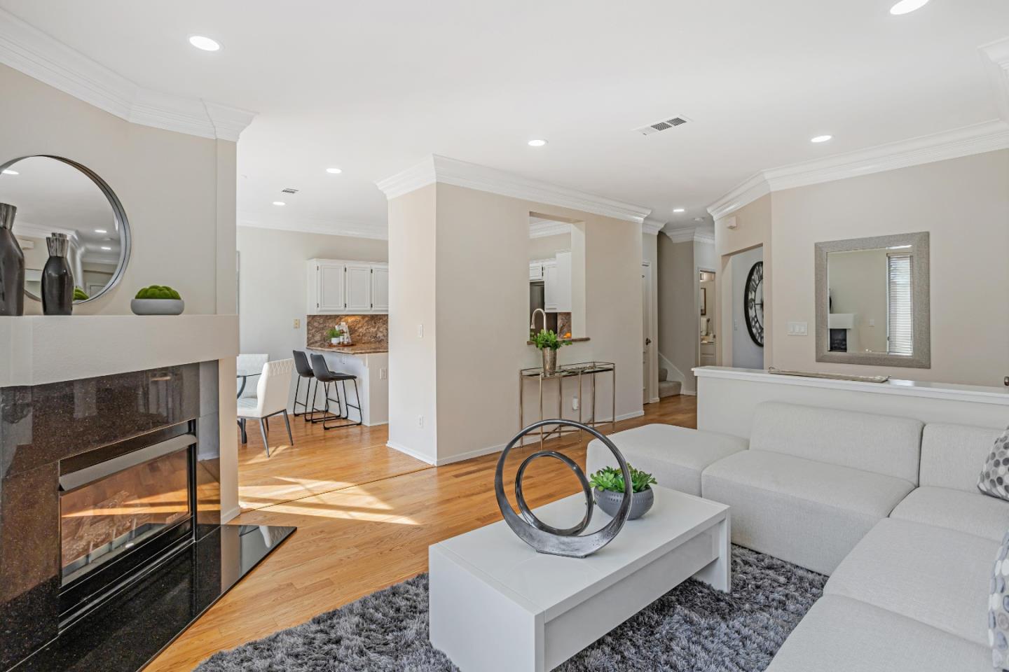 298 Gemstone Way Milpitas, CA 95035 - Photo 7 of 41 a living room with furniture and wooden floor