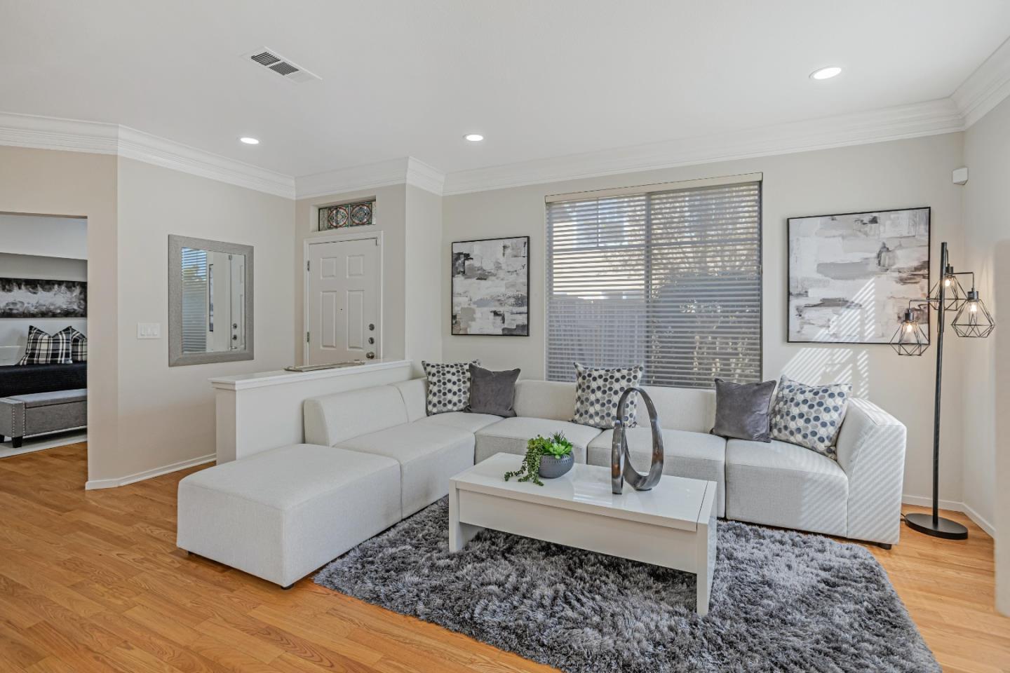 298 Gemstone Way Milpitas, CA 95035 - Photo 8 of 41 a living room with furniture and a large window
