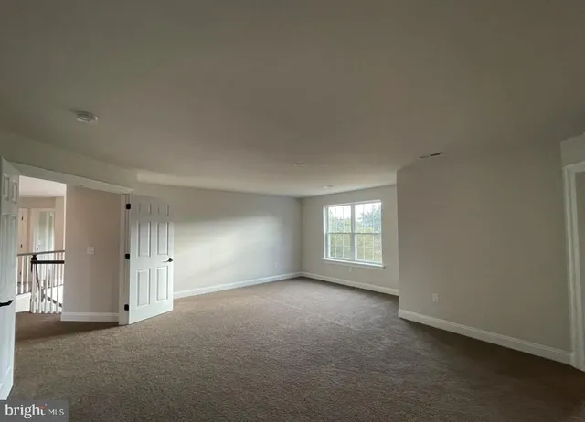 a bathroom with a double vanity sink mirror double and shower