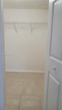 a view of small space with racks on the wall