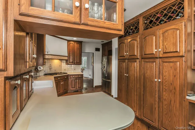 a view of a kitchen with a refrigerator