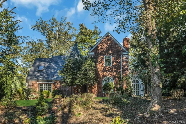 a aerial view of a house with a yard