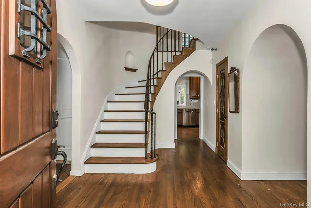a view of entryway with wooden floor