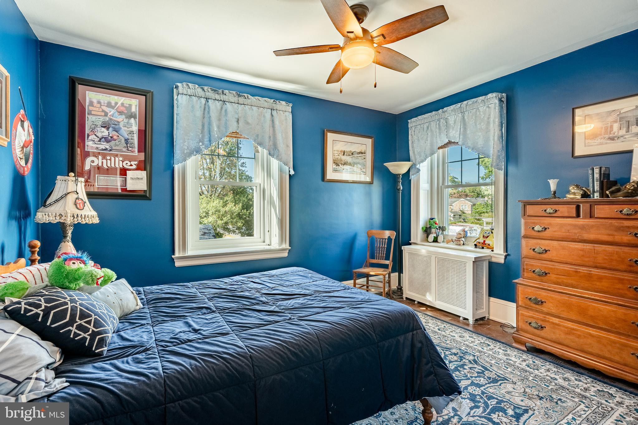 245 Rosedale Drive Pottstown, PA 19464 - Photo 28 of 57 a bedroom with a bed and a chandelier