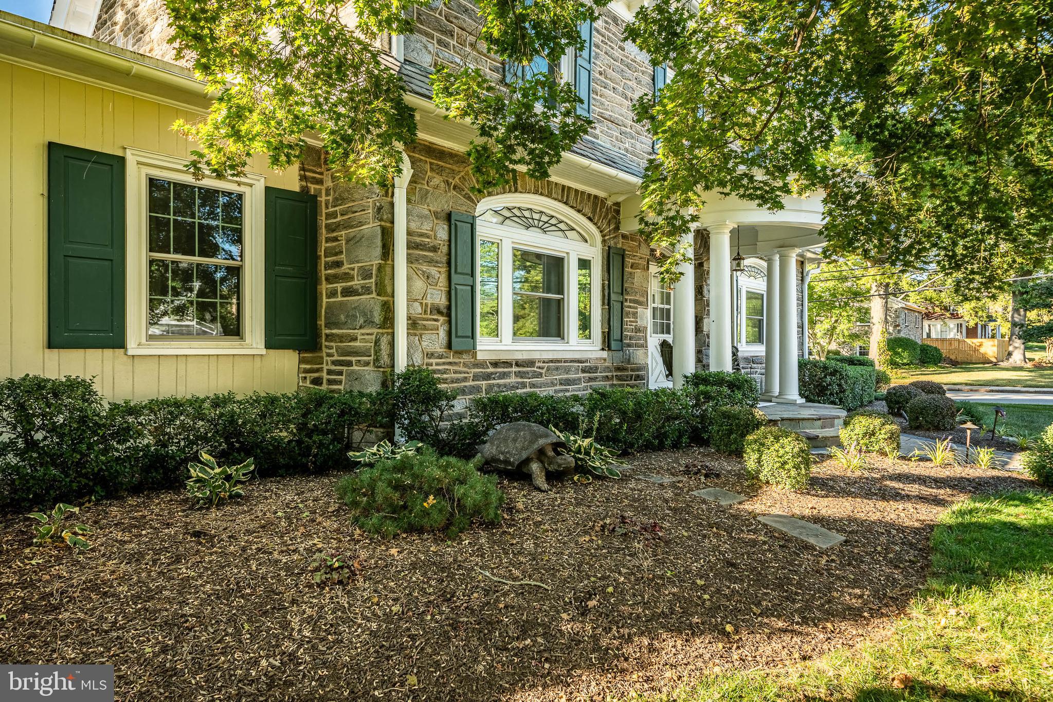 245 Rosedale Drive Pottstown, PA 19464 - Photo 6 of 57 a front view of a house with garden and porch