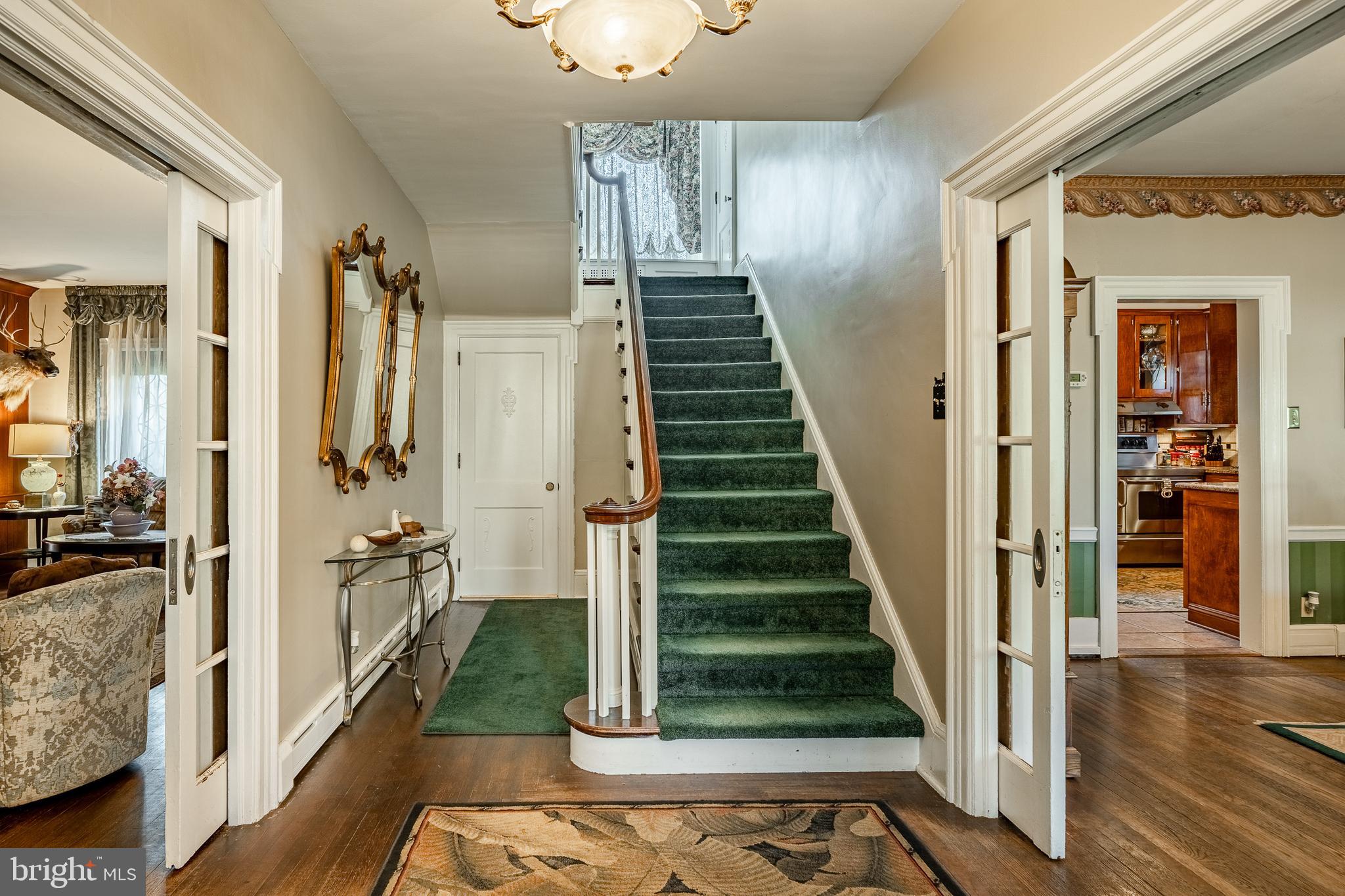 245 Rosedale Drive Pottstown, PA 19464 - Photo 7 of 57 a view of a hallway with wooden floor and staircase