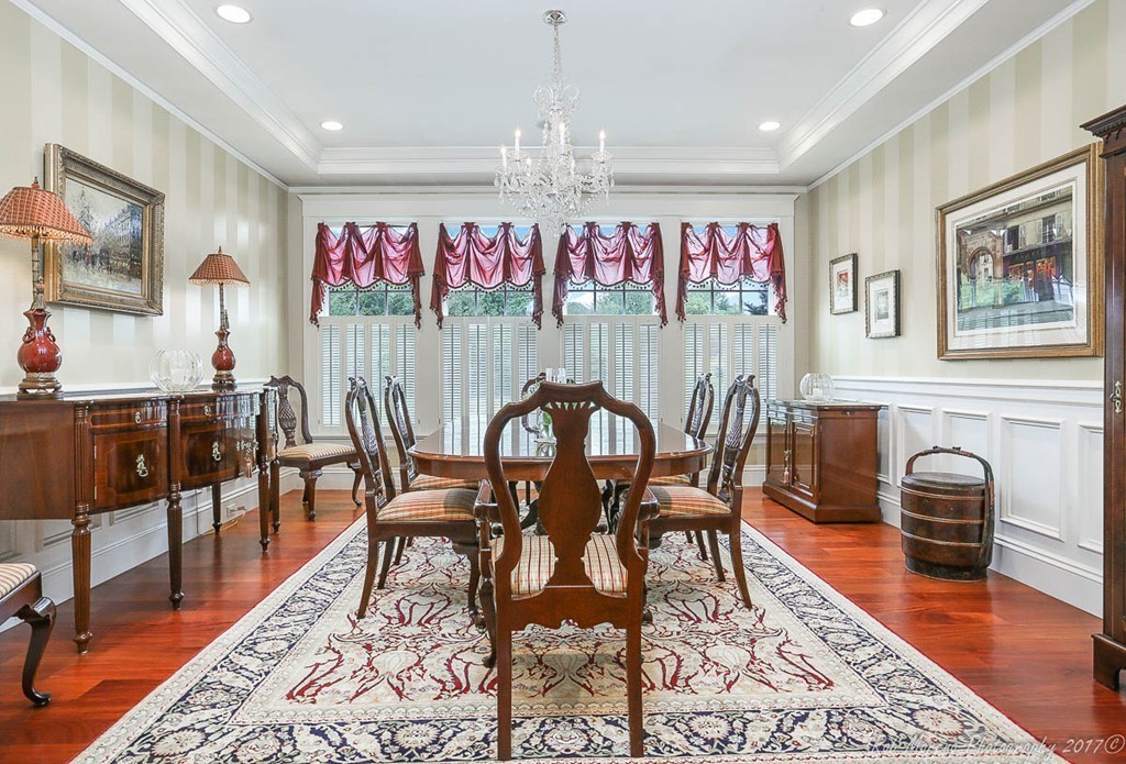 10 Hovey's Pond Boxford, MA 01921 - Photo 13 of 30 a view of a dining room and hall with furniture