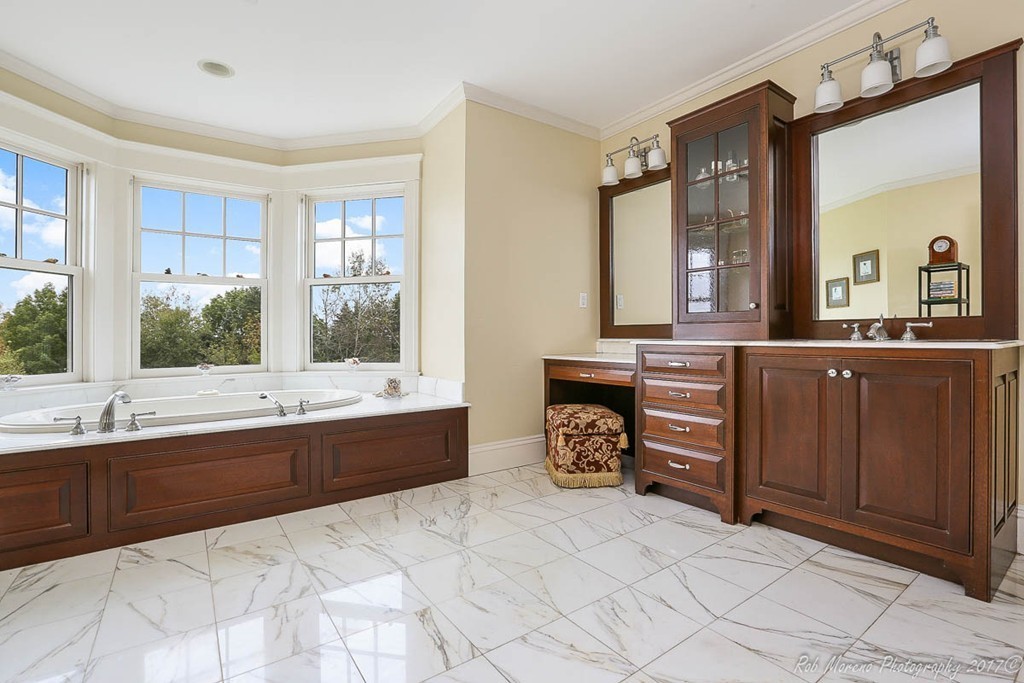 10 Hovey's Pond Boxford, MA 01921 - Photo 16 of 30 a spacious bathroom with a tub sink and mirror