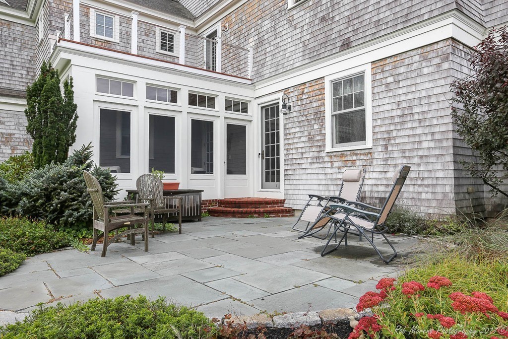 10 Hovey's Pond Boxford, MA 01921 - Photo 28 of 30 a backyard of a house with outdoor seating