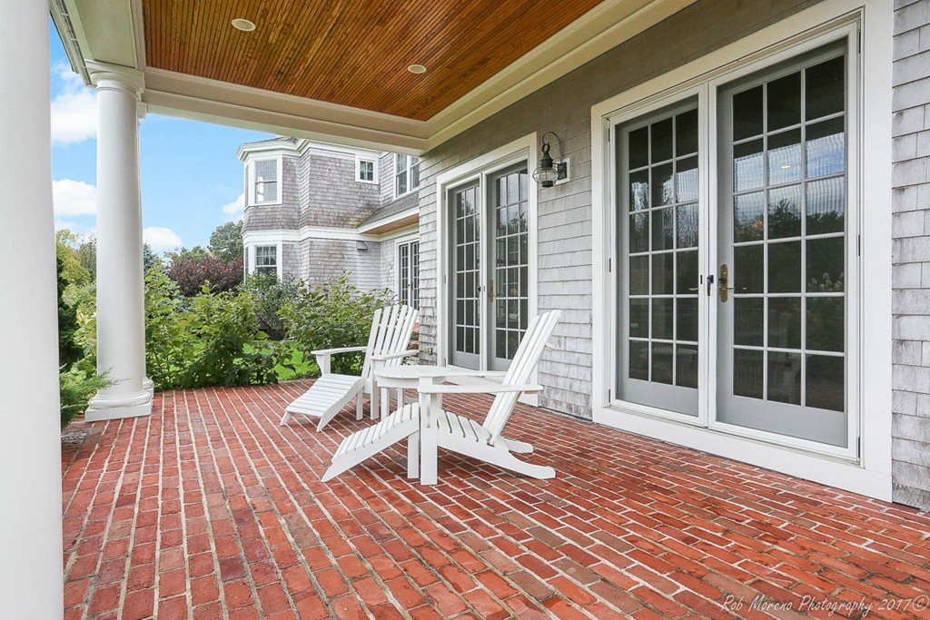 10 Hovey's Pond Boxford, MA 01921 - Photo 29 of 30 a house view with a seating space and garden space