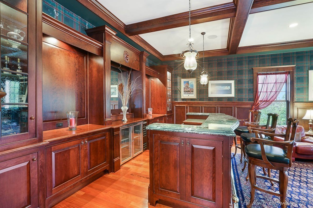 10 Hovey's Pond Boxford, MA 01921 - Photo 7 of 30 a kitchen with stainless steel appliances granite countertop a sink and wooden cabinets