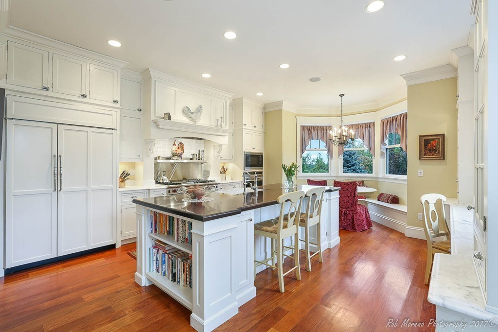 10 Hovey's Pond Boxford, MA 01921 - Photo 9 of 30 a kitchen with stainless steel appliances granite countertop a stove and a wooden floors