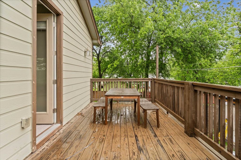 2947 Moss Street Austin, TX 78722 - Photo 17 of 20 Expansive outdoor deck featuring wood flooring and railings, offering generous space