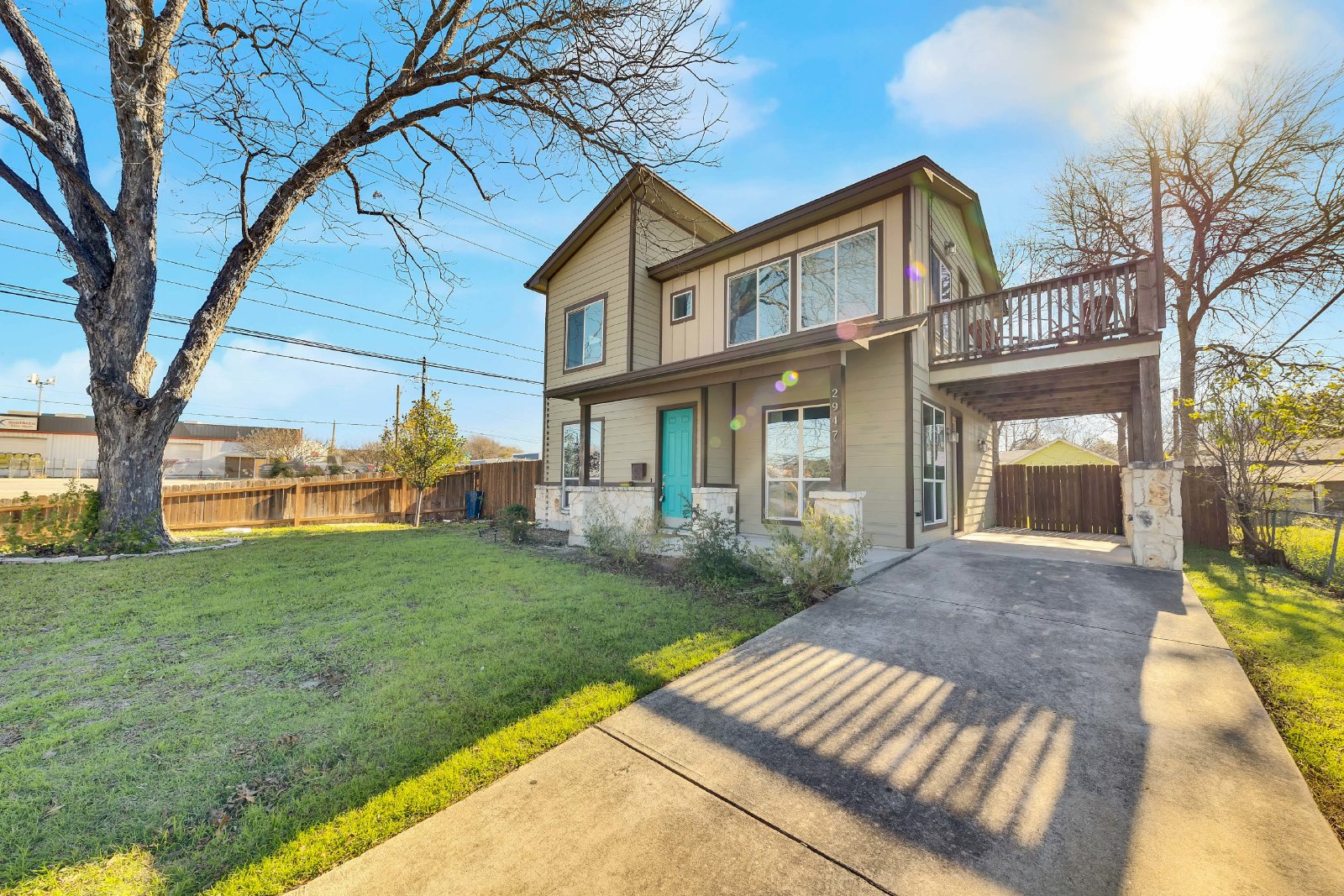 2947 Moss Street Austin, TX 78722 - Photo 2 of 20 Two-story residence featuring a contemporary exterior with multi-toned siding and stone accents