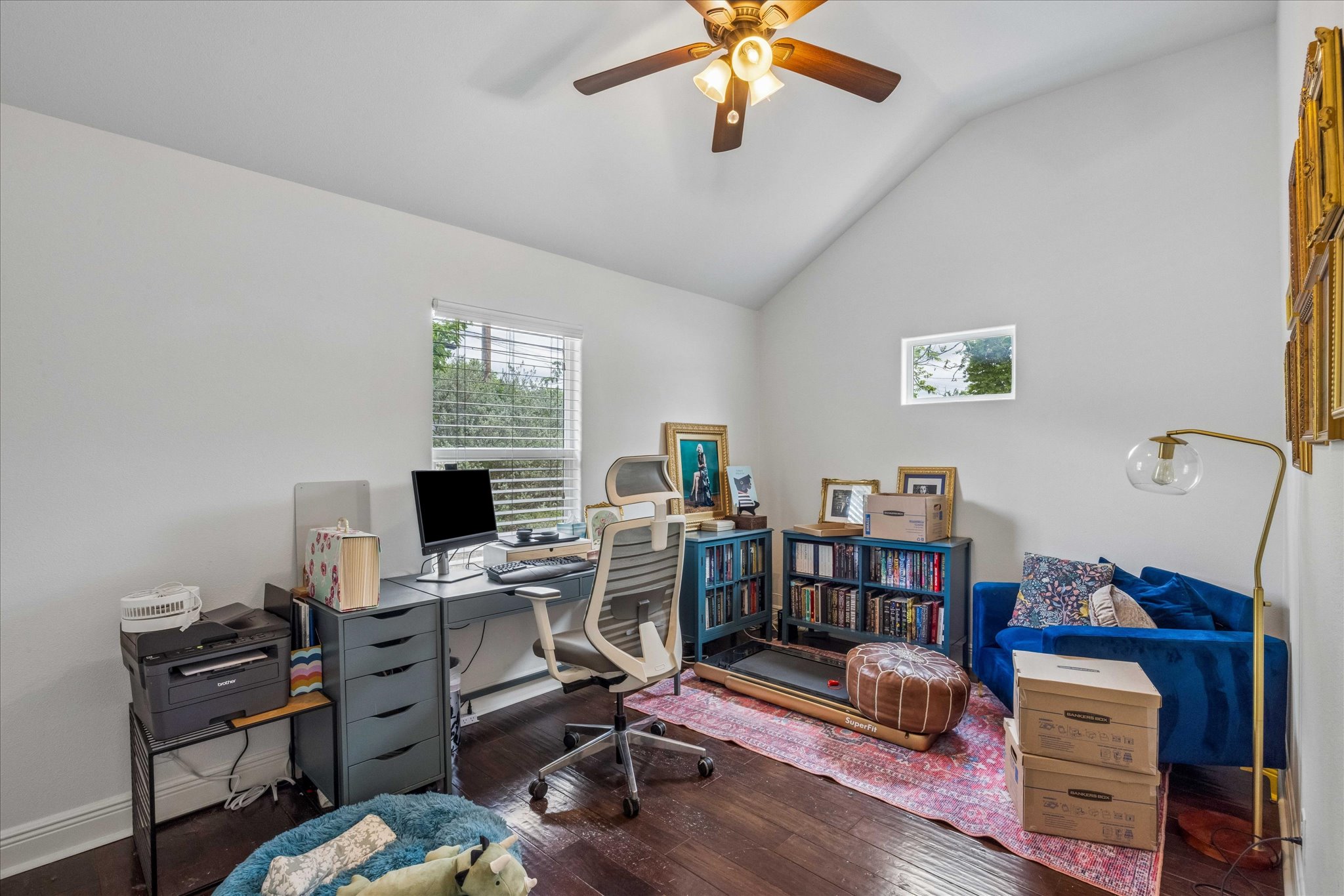 1800 Deloney Street Austin, TX 78721 - Photo 15 of 25 a view of a workspace with furniture and a ceiling fan