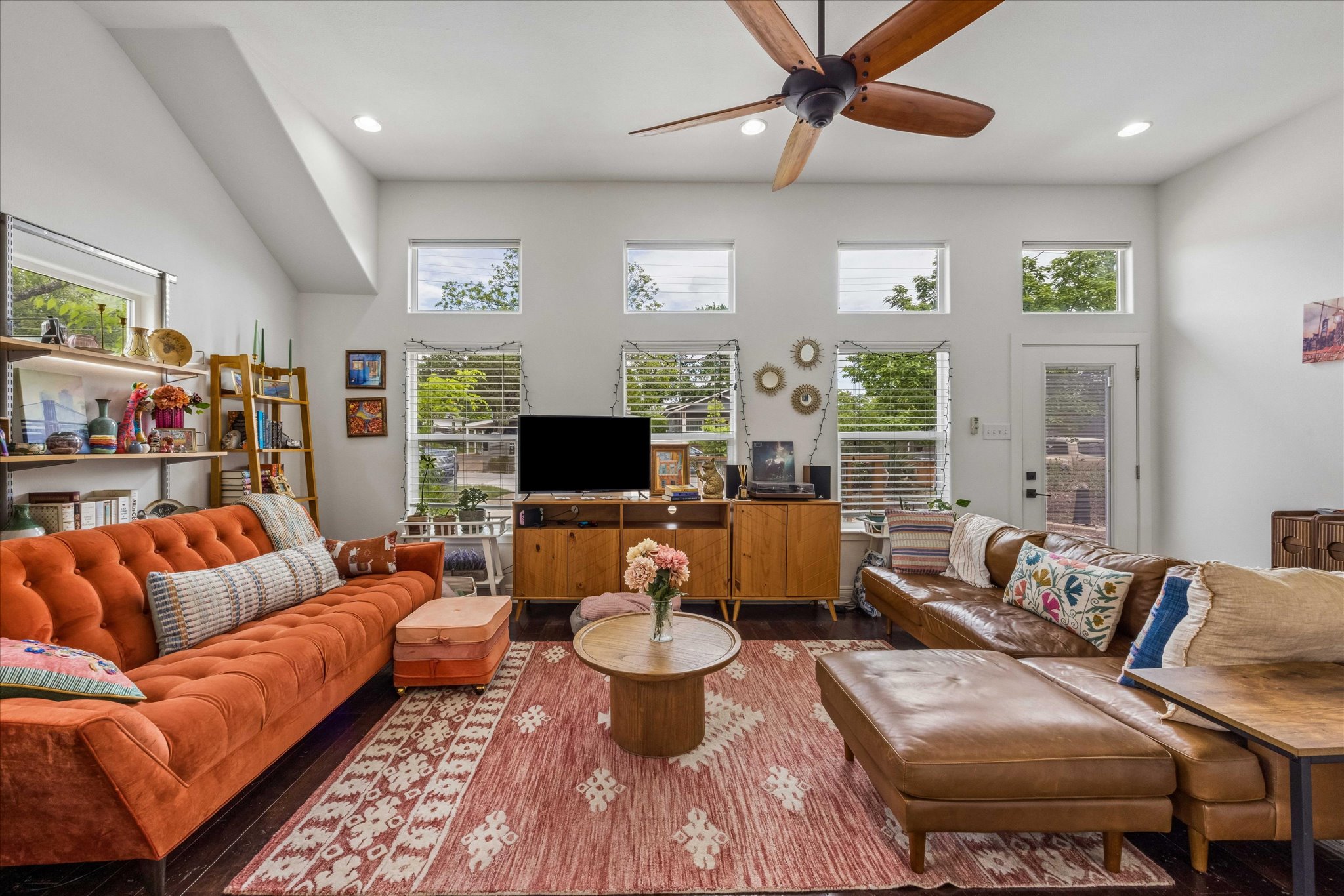 1800 Deloney Street Austin, TX 78721 - Photo 5 of 25 a living room with furniture and a flat screen tv