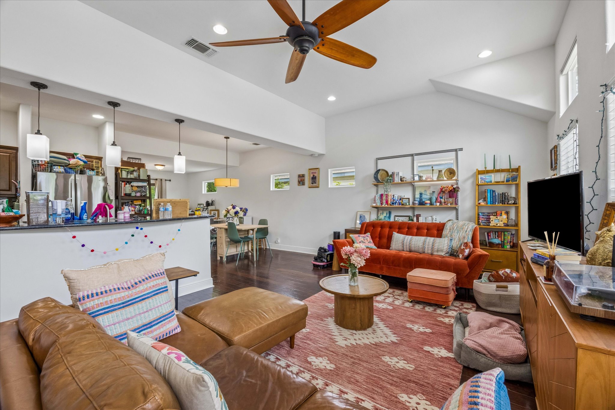 1800 Deloney Street Austin, TX 78721 - Photo 6 of 25 a living room with furniture and a flat screen tv