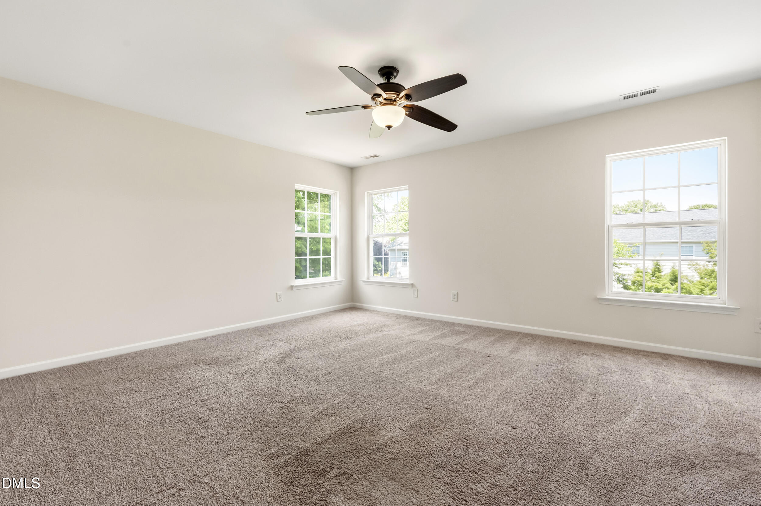 112 Ryder Cup Circle Raleigh, NC 27603 - Photo 22 of 45 a view of an empty room with a window