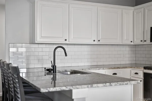 a close view of a sink and a table in a bathroom