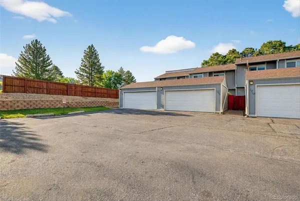 a front view of a house with a garage