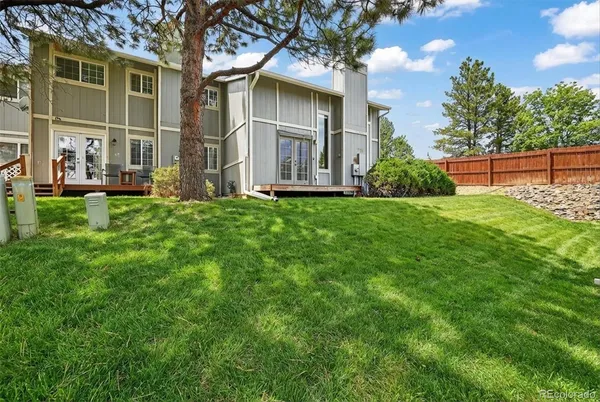front view of a house with a garden