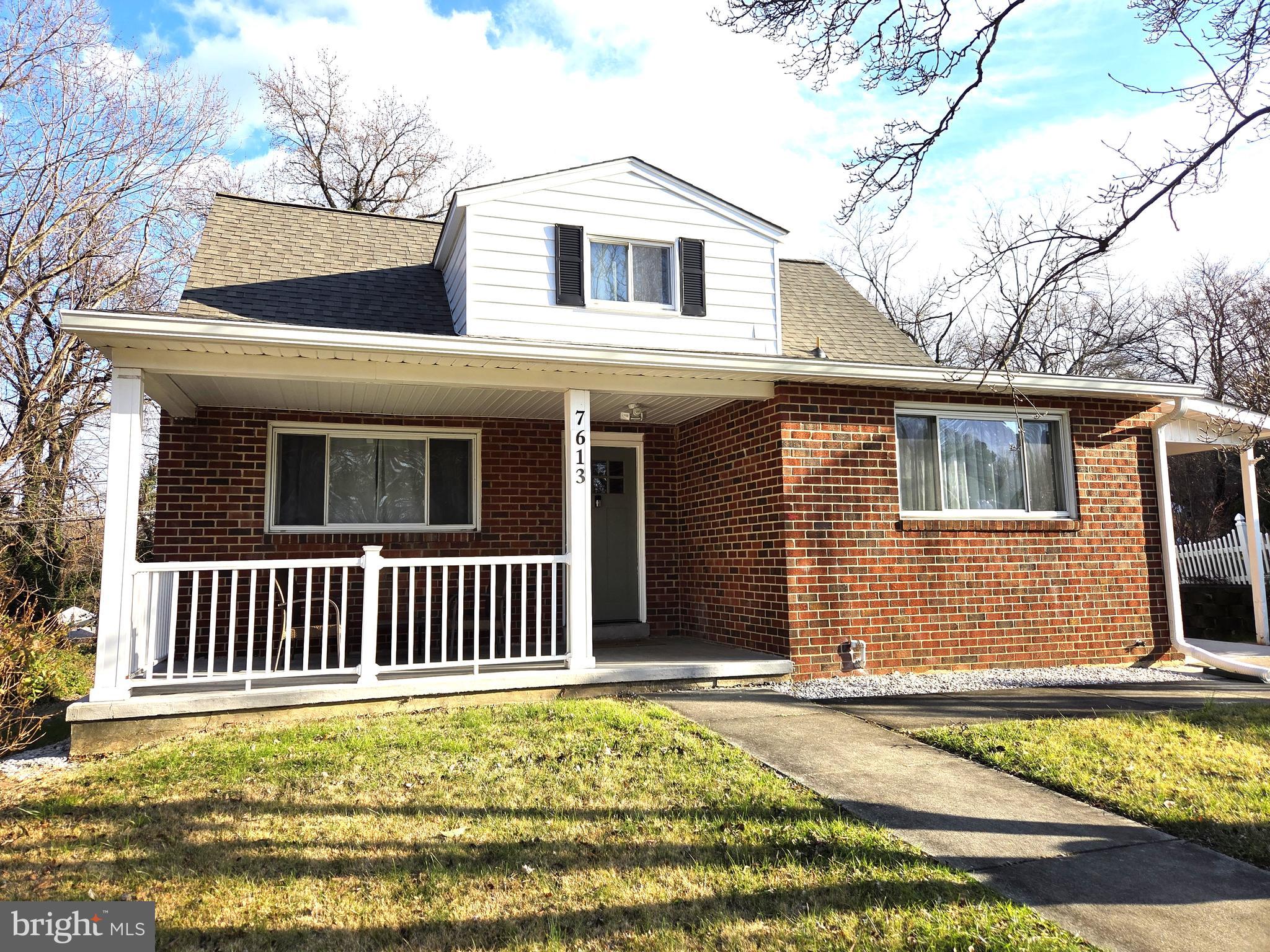 7613 Wilhelm Avenue Rosedale, MD 21237 - Photo 2 of 96 a front view of a house with a yard