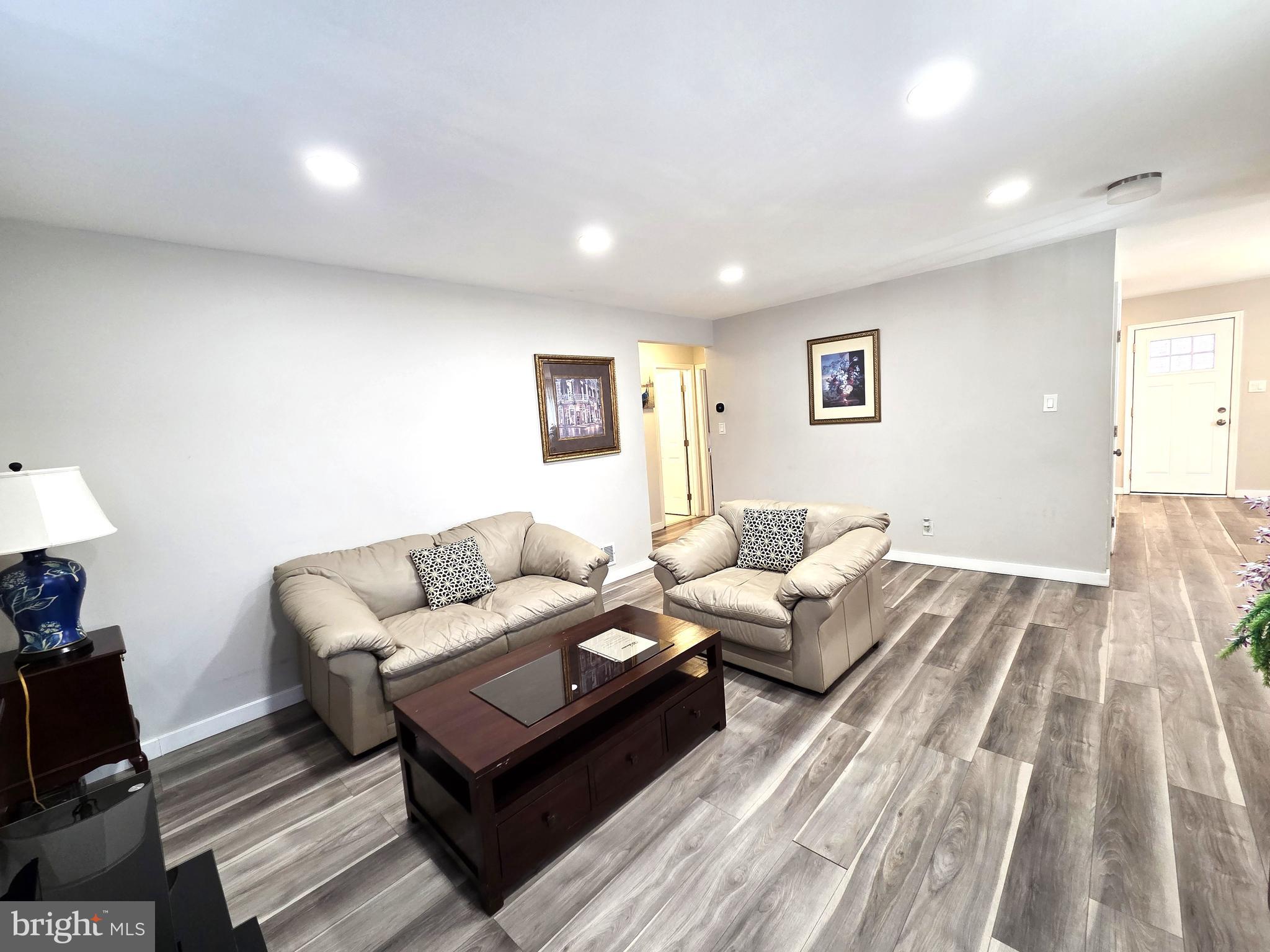 7613 Wilhelm Avenue Rosedale, MD 21237 - Photo 38 of 96 a living room with couches and a couch