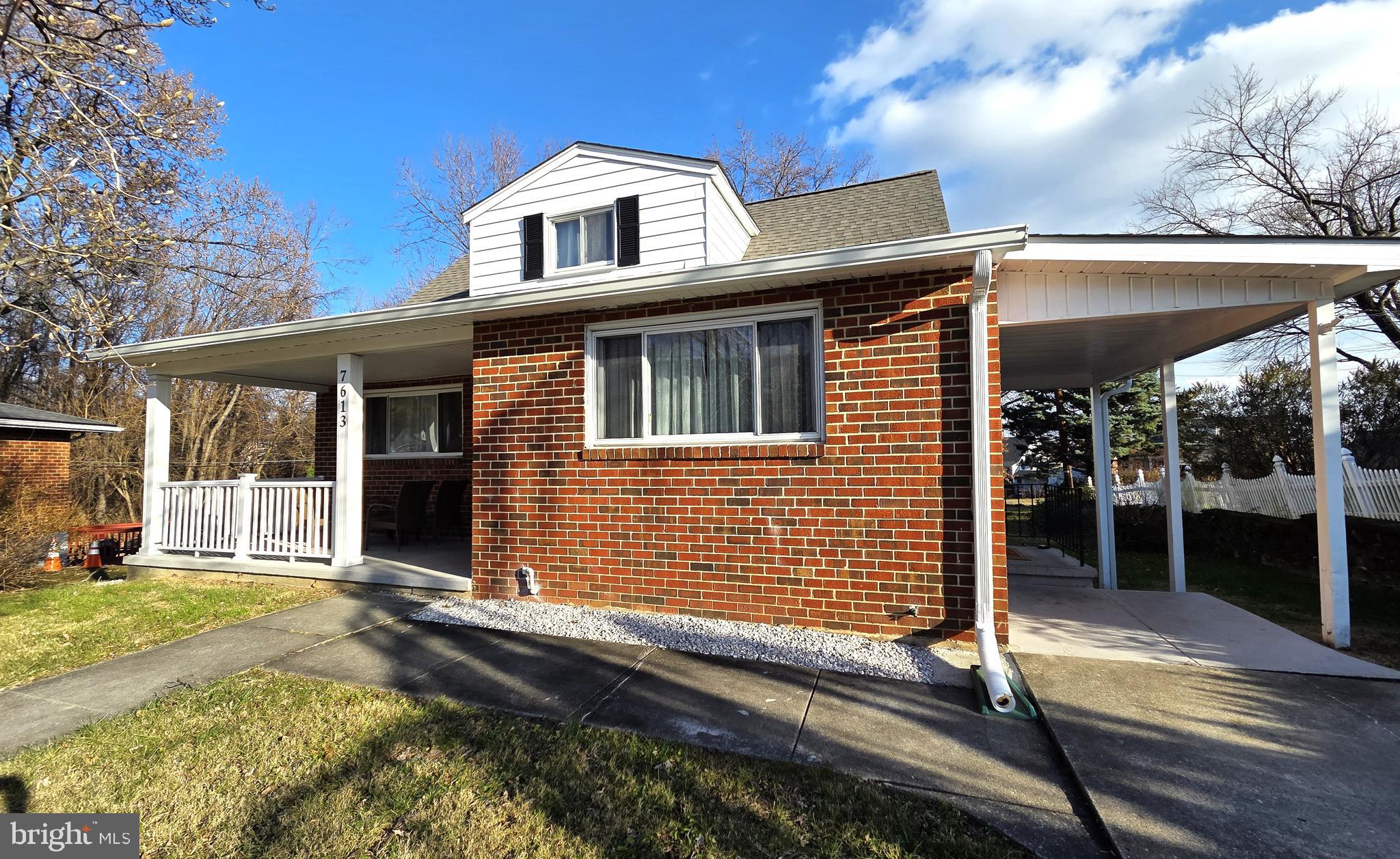 7613 Wilhelm Avenue Rosedale, MD 21237 - Photo 4 of 96 a front view of a house with a yard