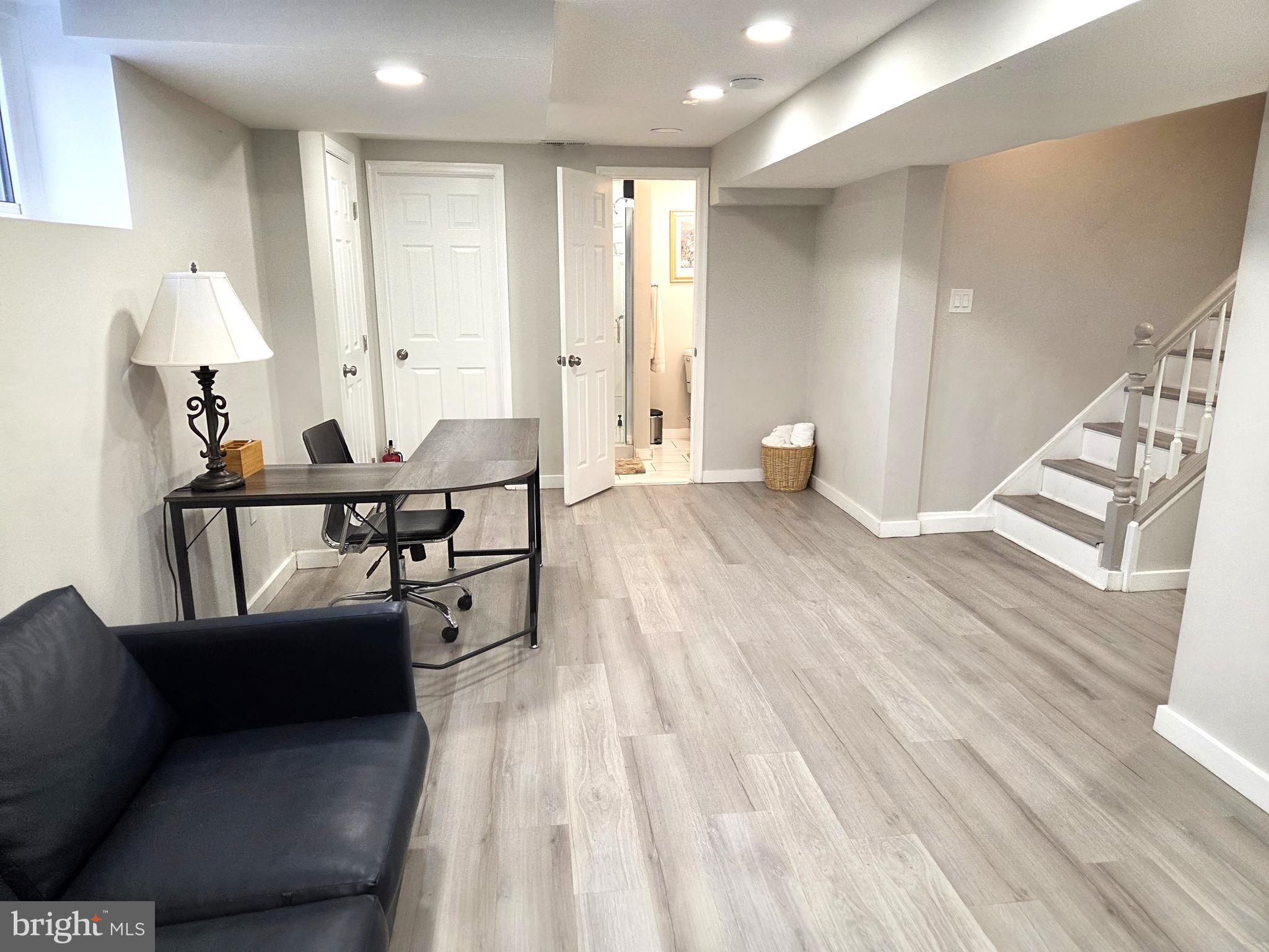 7613 Wilhelm Avenue Rosedale, MD 21237 - Photo 89 of 96 a living room with furniture and wooden floor