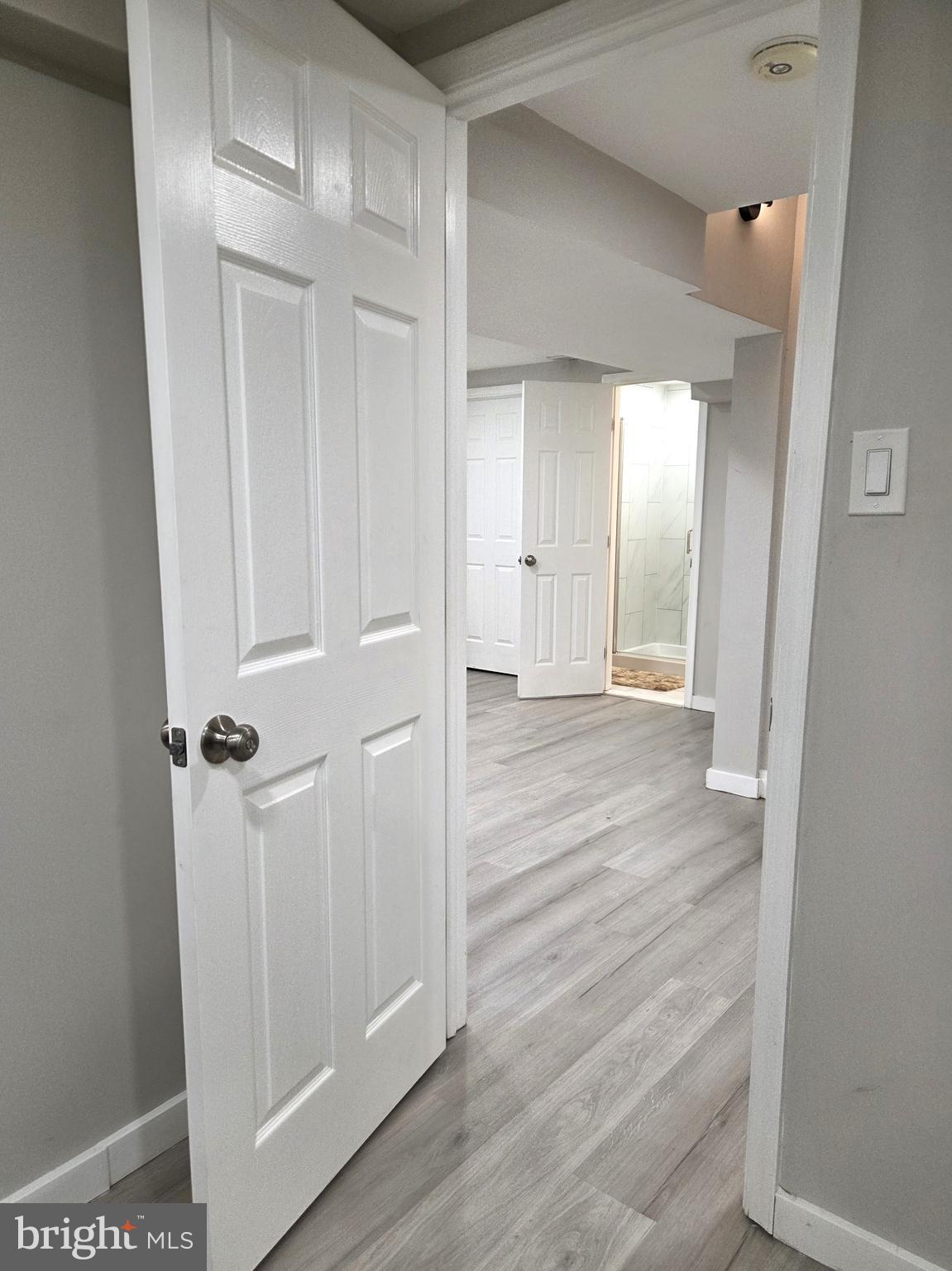7613 Wilhelm Avenue Rosedale, MD 21237 - Photo 91 of 96 a view of a hallway with wooden floor