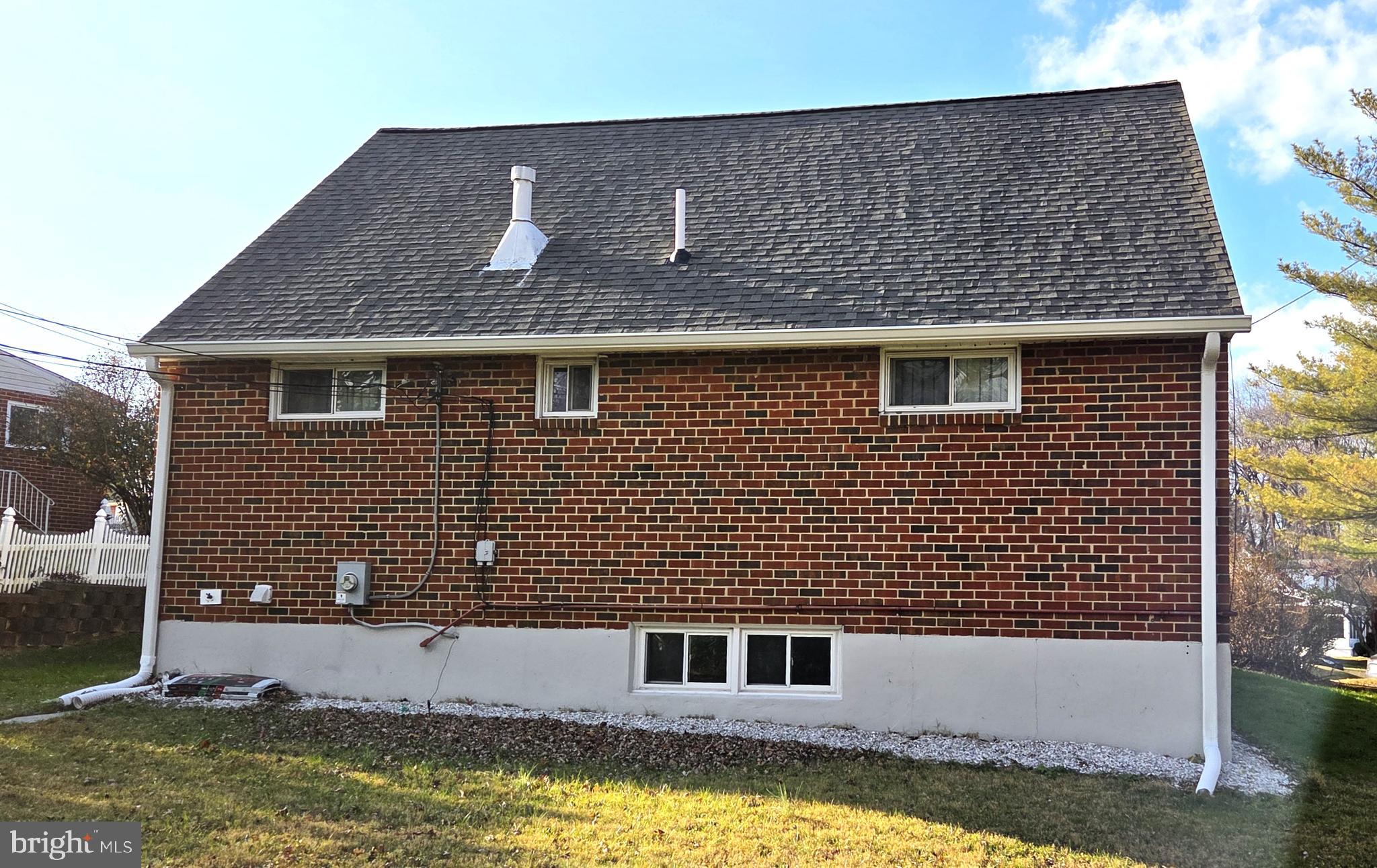 7613 Wilhelm Avenue Rosedale, MD 21237 - Photo 95 of 96 a front view of a house with a yard