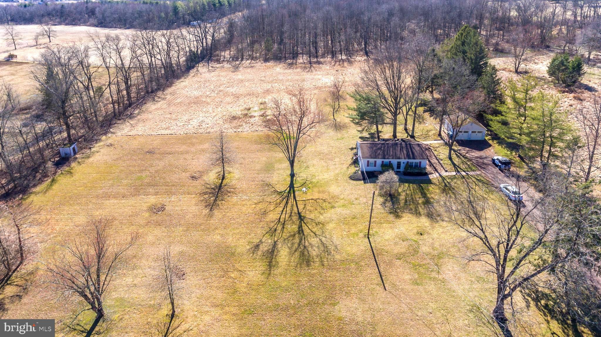 1306 Sylvan Road Perkasie, PA 18944 - Photo 2 of 47 a view of yard along with trees