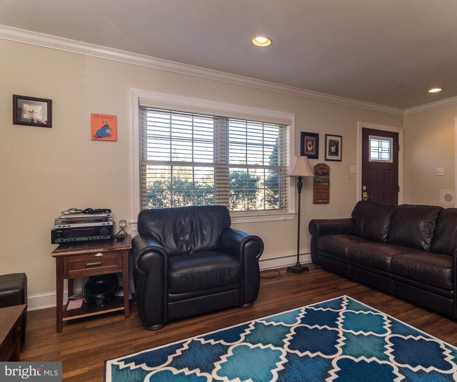 1306 Sylvan Road Perkasie, PA 18944 - Photo 11 of 47 a living room with furniture and a rug