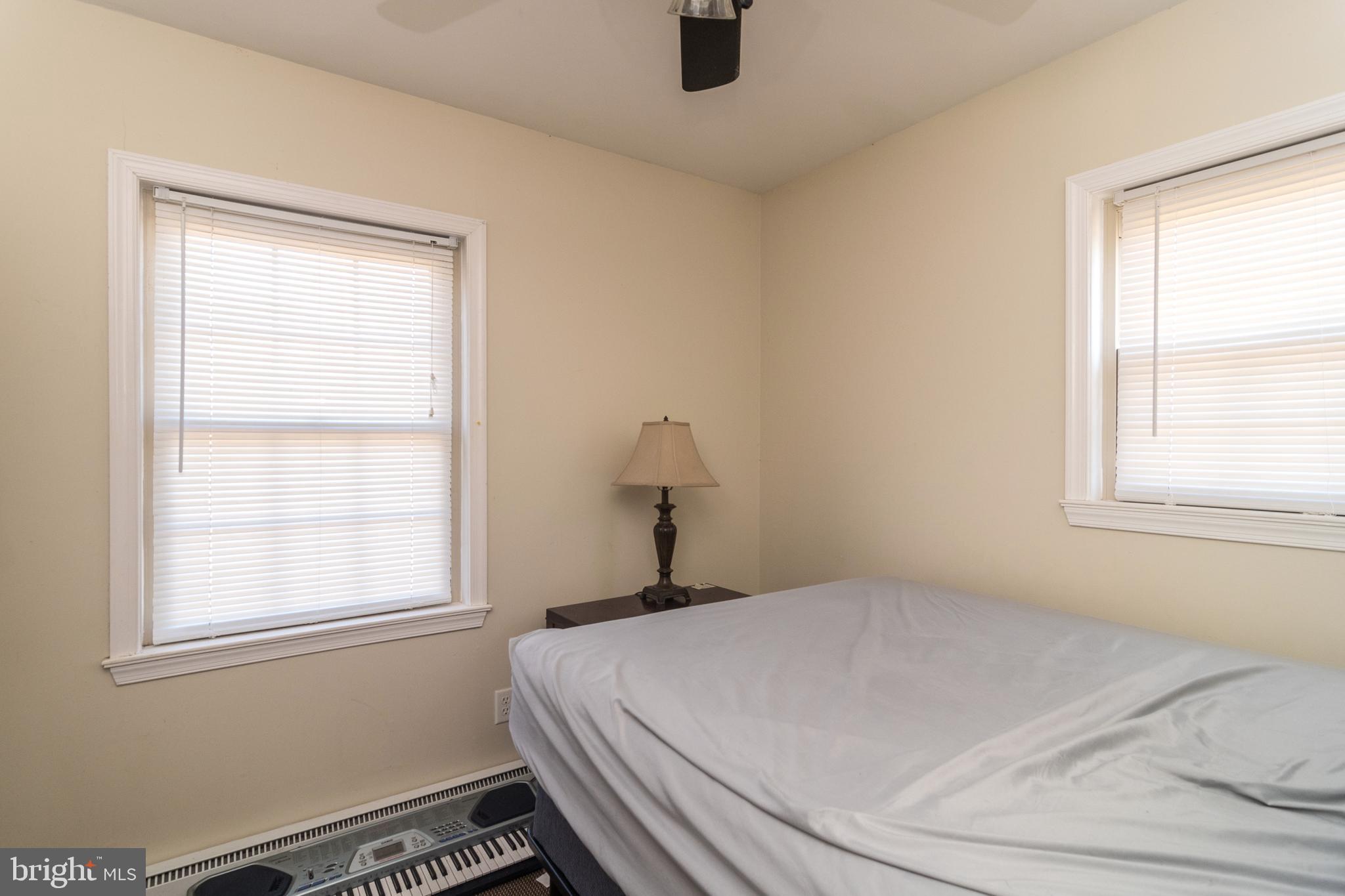 1306 Sylvan Road Perkasie, PA 18944 - Photo 28 of 47 a bedroom with a bed and a window