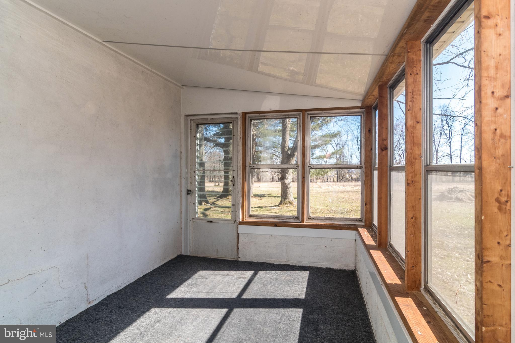 1306 Sylvan Road Perkasie, PA 18944 - Photo 39 of 47 a big room with wooden floor and windows