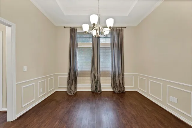 a view of gallery with wooden floor