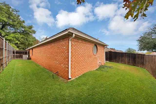 a view of backyard with green space