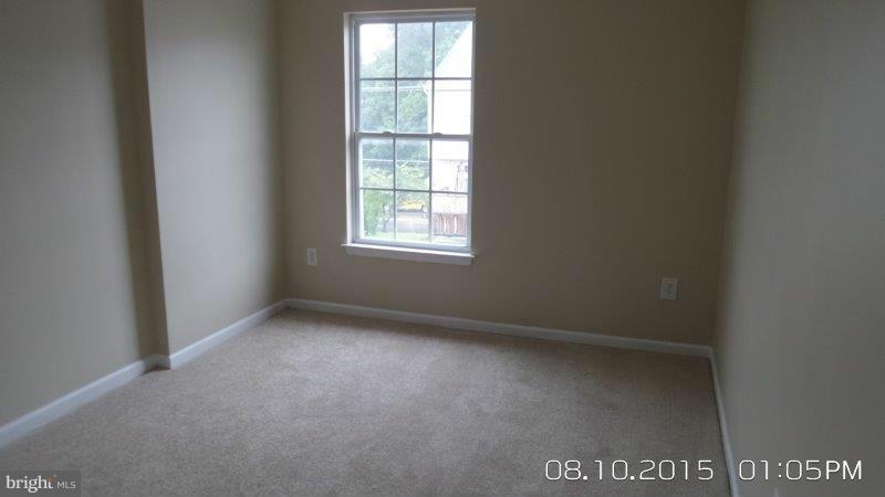 892 Lowe Road Baltimore, MD 21220 - Photo 15 of 19 an empty room with a window