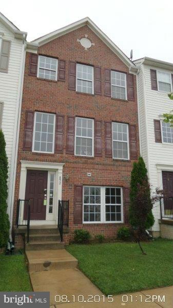 892 Lowe Road Baltimore, MD 21220 - Photo 17 of 19 front view of a brick house