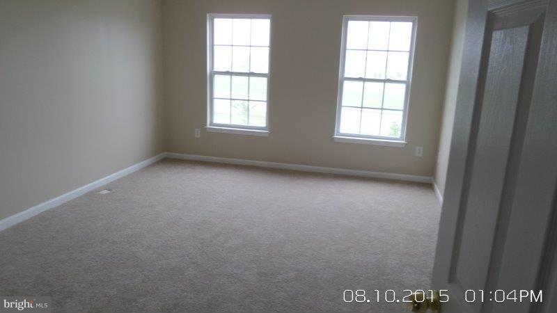 892 Lowe Road Baltimore, MD 21220 - Photo 8 of 19 an empty room with a window